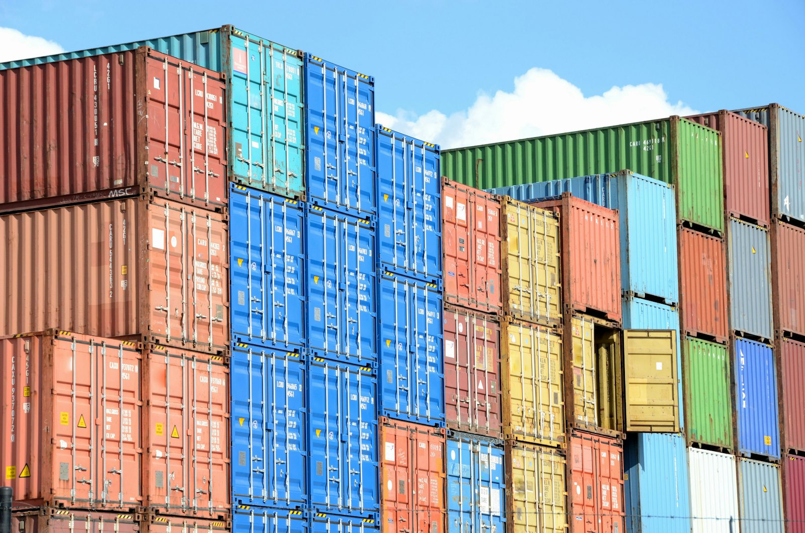 Walls of stacked shipping containers
